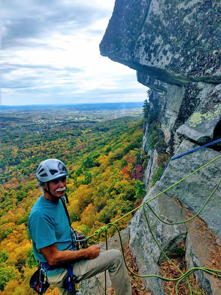 Man climbing the Gunks in the Fall